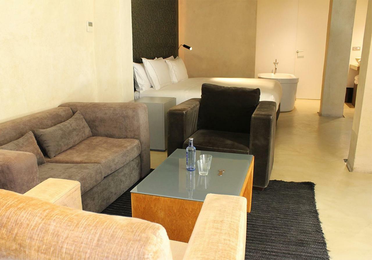 Eme Catedral Mercer Hotel Sevilla Kültér fotó A suite at the hotel