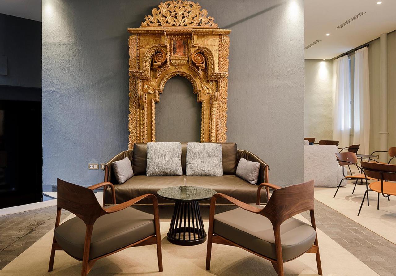 Eme Catedral Mercer Hotel Sevilla Kültér fotó The Library at The Park, New Delhi